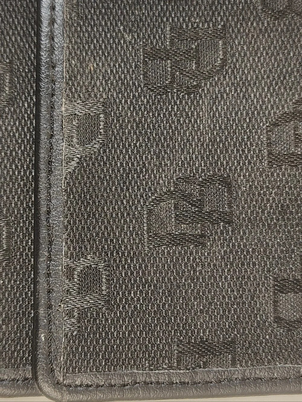 Dooney & Bourke Black triple bi fold wallet